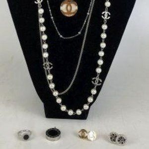 Chanel necklace, earrings, Bvulgari ring, pendant, Tory Burch earrings